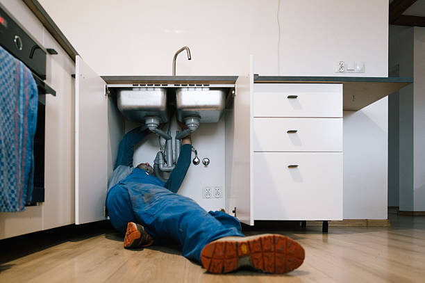 Professional Emergency Plumber technician working in Cameron, WI